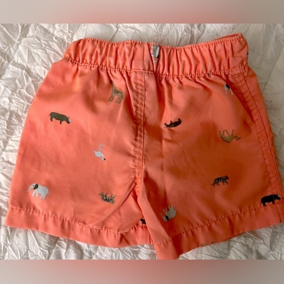 9m kid swim trunks. Orange with little wild animals. Functional drawstring - Picture 2 of 3